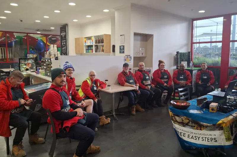 Hardware workers having a meeting