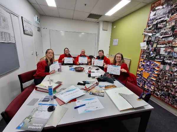 Workers holding certificate