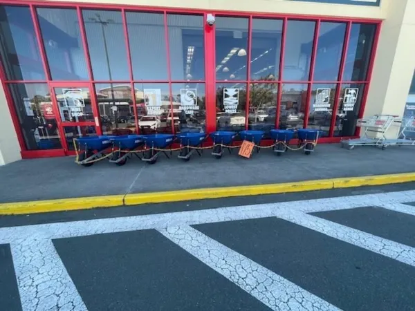 Wheelbarrows outside a store