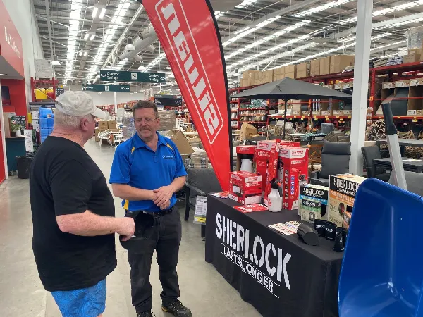 Salesman helping a customer